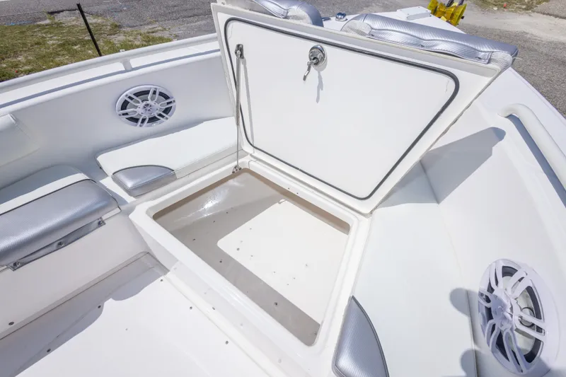 Slide: The Image of Open storage compartment on 2012 Everglades 243 Center Console boat deck. - 34