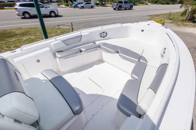 Slide: The Image of 2012 Everglades 243 Center Console boat with spacious seating and modern design. - 29
