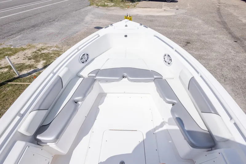 Slide: The Image of 2012 Everglades 243 Center Console boat with spacious seating and modern design. - 30