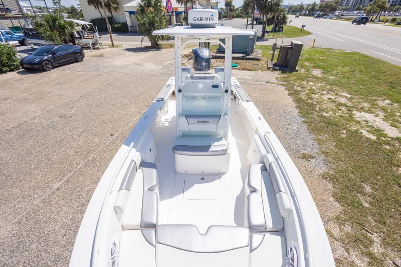Slide: The Image of 2012 Everglades 243 Center Console boat with spacious seating and Garmin equipment. - 31