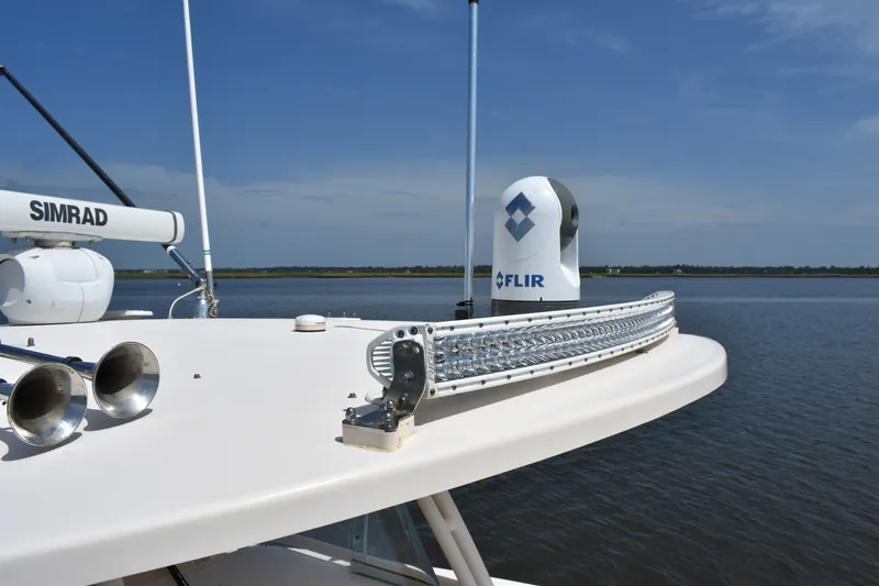 Slide: The Image of 2019 Grady-White Canyon 336 boat with Simrad and FLIR equipment on deck. - 33