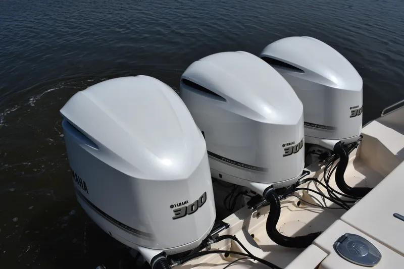 Slide: The Image of Triple Yamaha 300 outboard engines on a 2019 Grady-White Canyon 336 boat. - 25