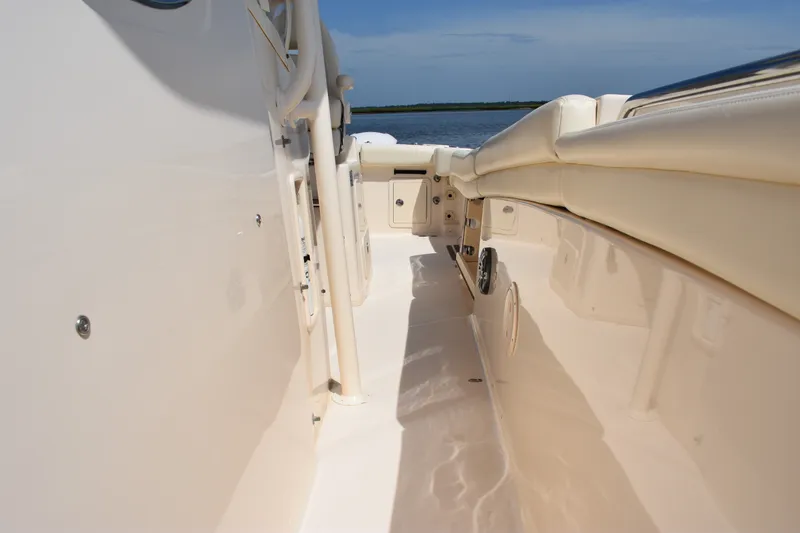 Slide: The Image of 2019 Grady-White Canyon 336 boat interior with sleek design and comfortable seating. - 19