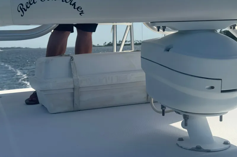 Slide: The Image of 2003 PROLINE 33 Express boat deck with radar and storage box. - 15