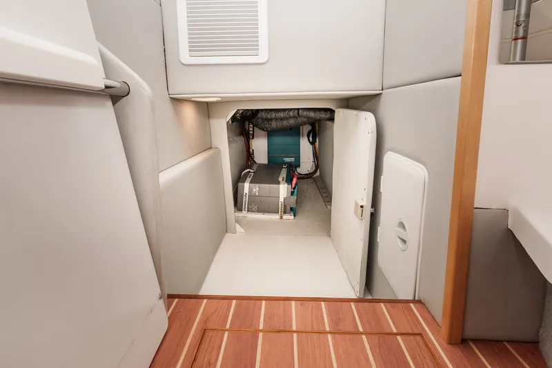 Slide: The Image of Engine compartment of 2021 ArrowCat 320 boat, featuring clean, organized layout. - 28