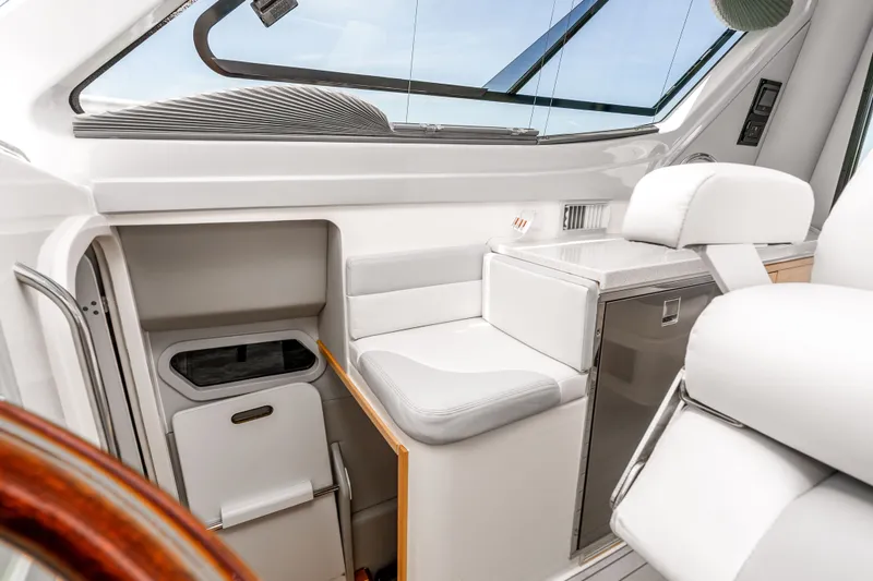 Slide: The Image of Interior of 2021 ArrowCat 320 boat with modern seating and sleek design. - 24