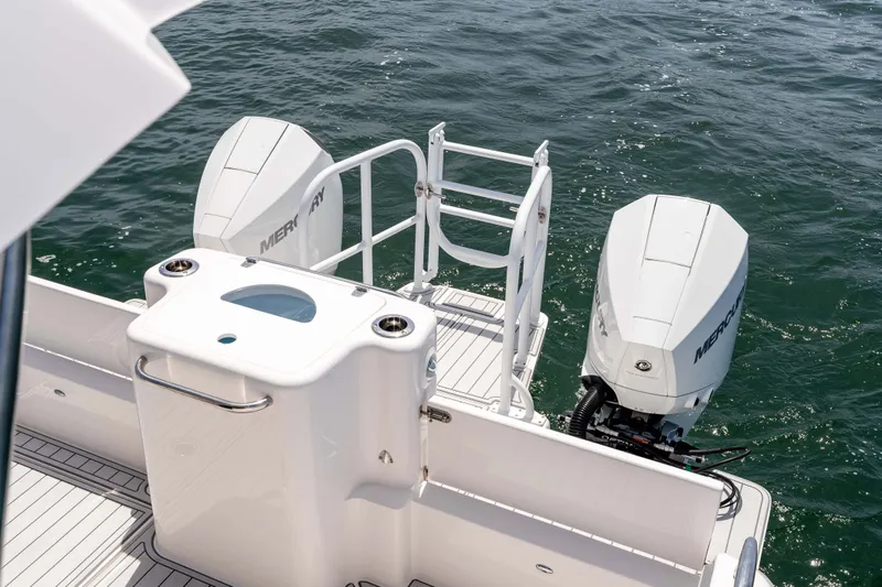 Slide: The Image of ArrowCat 320 boat with dual Mercury outboard engines on open water, 2021 model. - 14