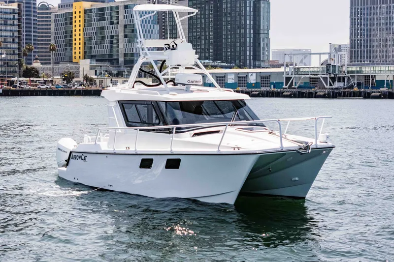 Slide: The Image of 2021 ArrowCat 320 boat cruising in urban waterfront setting. - 3