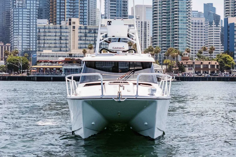 Slide: The Image of Front view of 2021 ArrowCat 320 yacht on urban waterfront. - 4