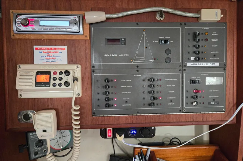 Slide: The Image of Control panel of a 1990 Pearson 385 yacht with radio and navigation systems. - 13