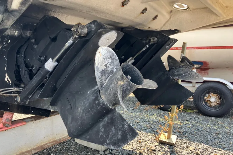 Slide: The Image of 2006 Sea Ray 290 Sun Sport boat propellers and stern drive detail. - 3