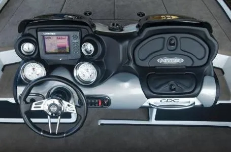 Slide: The Image of The image shows the cockpit of a 2011 Nitro Z9 CDC boat with steering and instruments. - 2