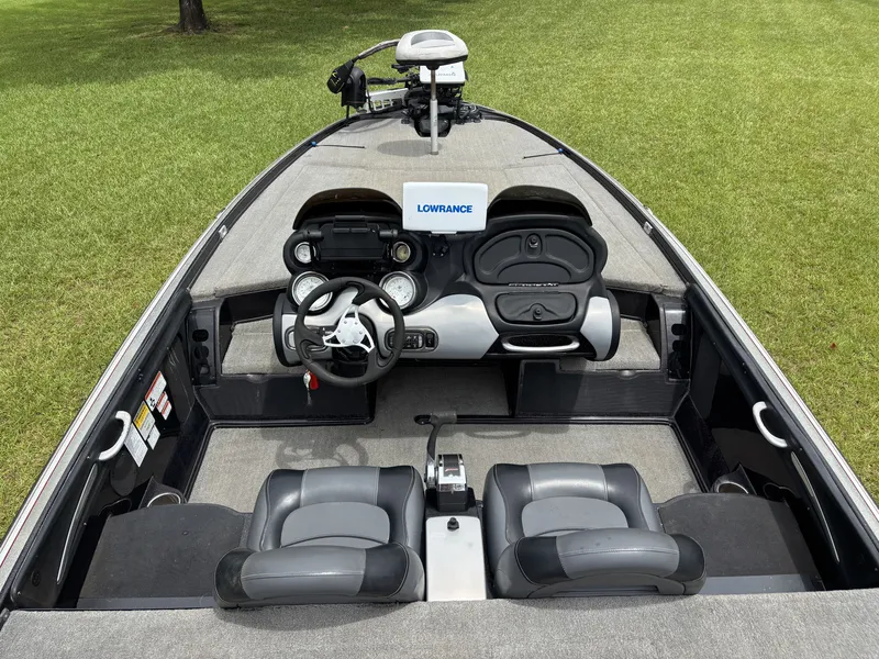 Slide: The Image of The image shows the cockpit of a 2011 Nitro Z9 CDC boat with gray seats and a Lowrance device. - 14