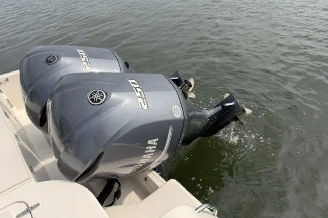 Slide: The Image of Twin Yamaha 250 outboard engines on a 2015 Grady-White Freedom 285 boat. - 5