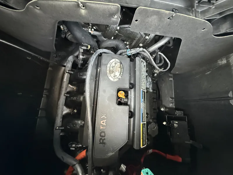 Slide: The Image of The engine compartment of a 2023 Sea-Doo Switch Cruise with a Rotax engine is visible. - 16