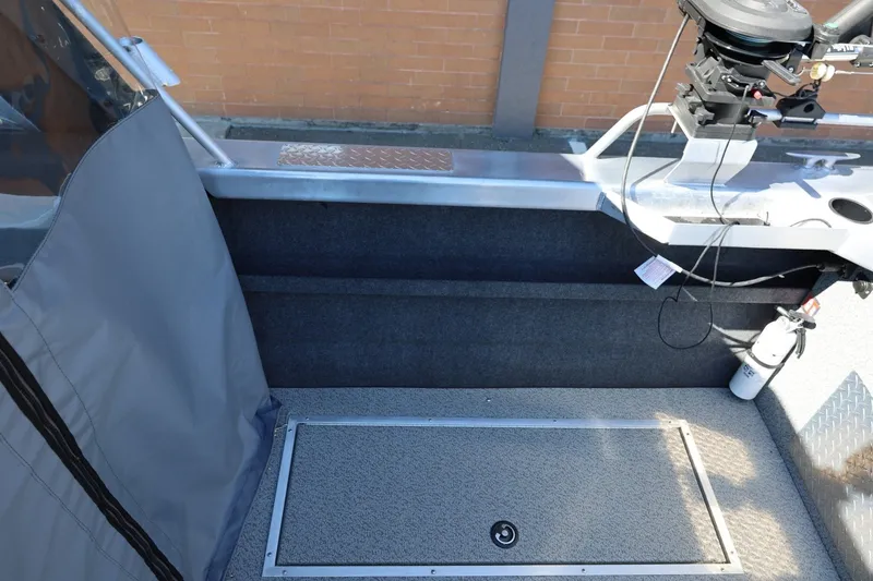 Slide: The Image of Interior view of a 2025 Thunder Jet 200 Luxor boat, featuring storage and equipment. - 26