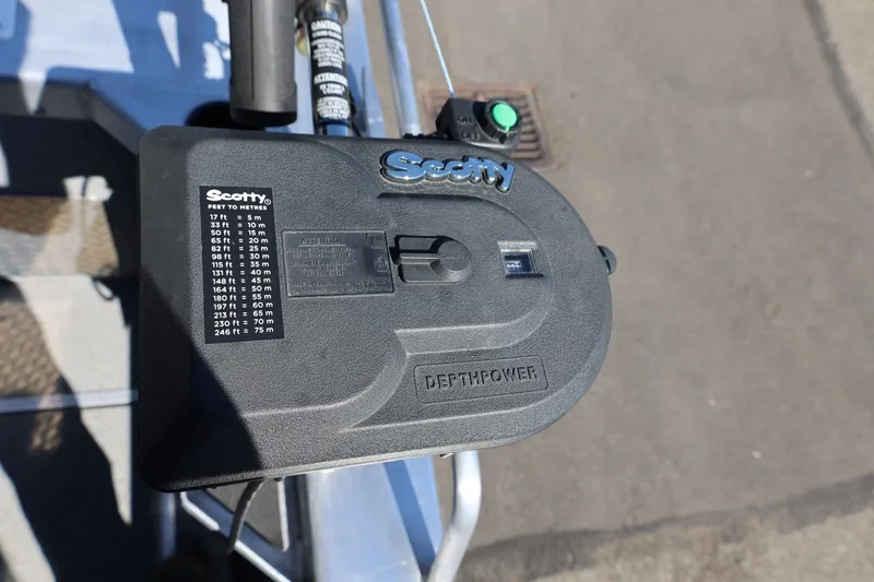 Slide: The Image of Close-up of a Scotty Depthpower control on a 2025 Thunder Jet 200 Luxor boat. - 60