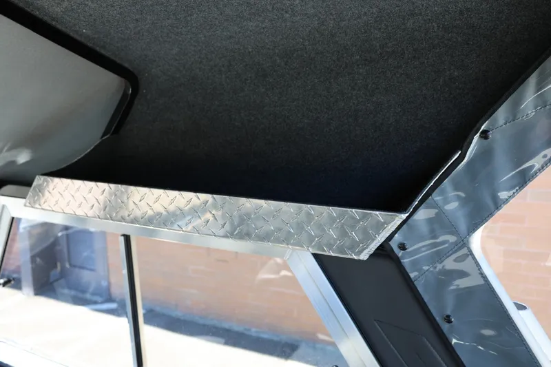 Slide: The Image of Interior detail of 2025 Thunder Jet 200 Luxor boat with diamond plate trim. - 40