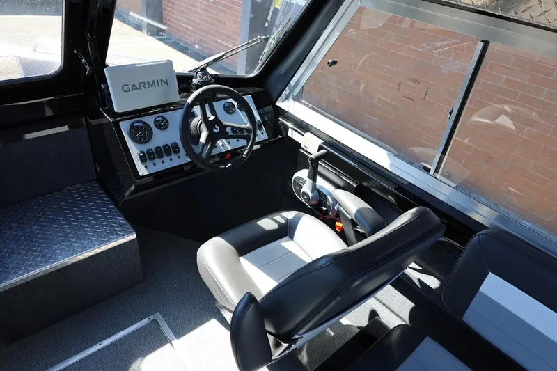Slide: The Image of Interior of 2025 Thunder Jet 200 Luxor boat with Garmin navigation system. - 41