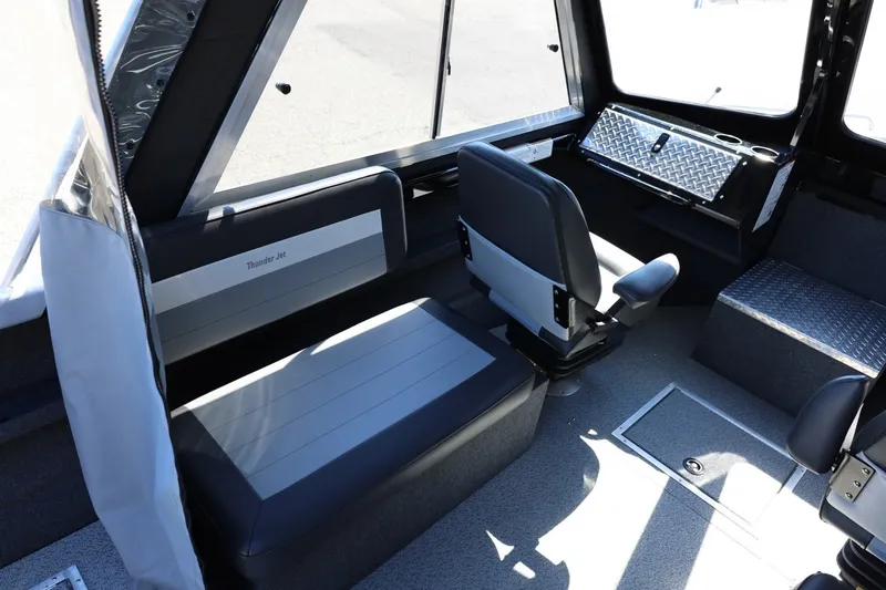 Slide: The Image of Interior of 2025 Thunder Jet 200 Luxor boat with seating and storage compartments. - 35