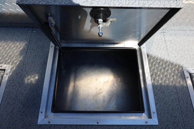 Slide: The Image of Open storage compartment in 2025 Thunder Jet 200 Luxor boat, featuring durable interior design. - 28