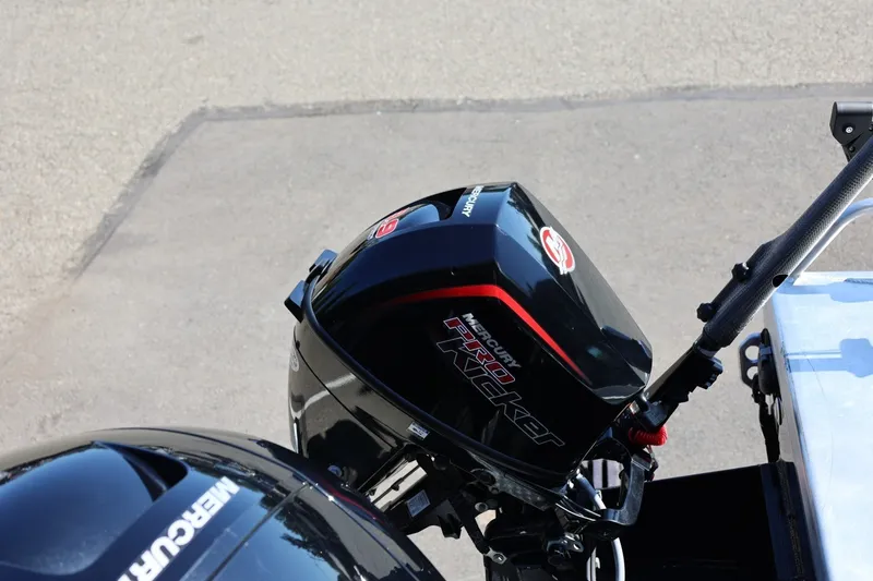 Slide: The Image of Outboard motor on a 2025 Thunder Jet 200 Luxor boat, featuring Mercury branding. - 17
