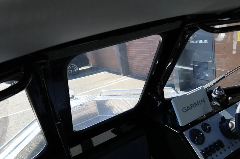 Slide: The Image of Interior view of 2025 Thunder Jet 200 Luxor boat with Garmin navigation system. - 55