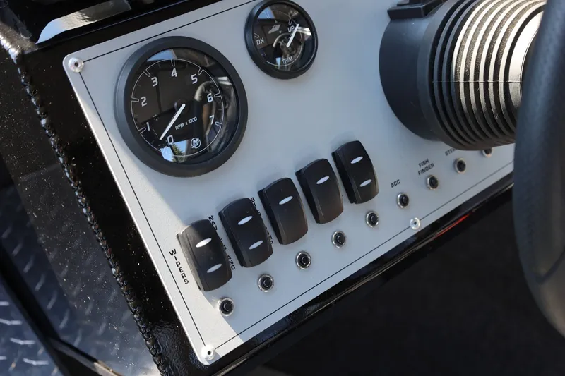 Slide: The Image of Dashboard of 2025 Thunder Jet 200 Luxor boat with gauges and switches. - 45