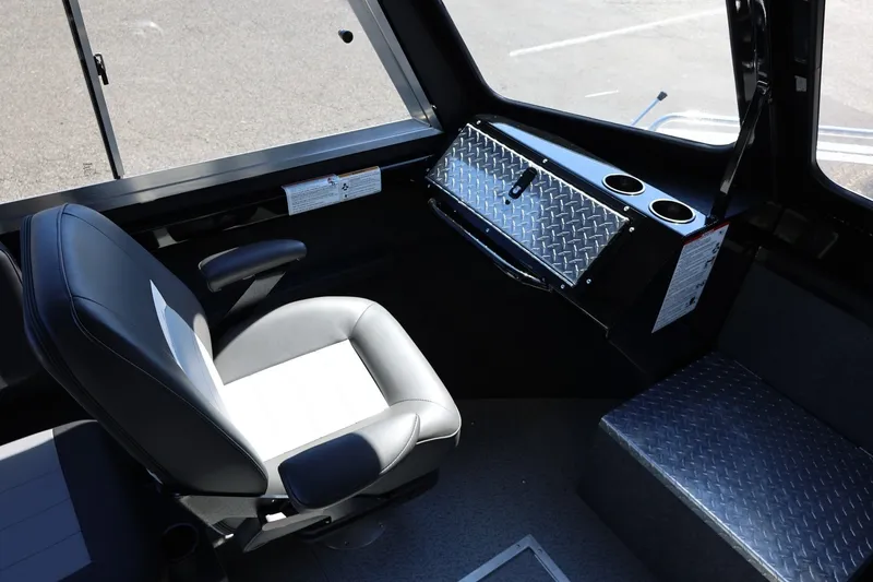 Slide: The Image of Interior of 2025 Thunder Jet 200 Luxor boat with seating and storage compartments. - 49