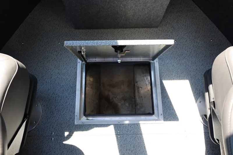 Slide: The Image of Open storage compartment in 2025 Thunder Jet 200 Luxor boat interior. - 53