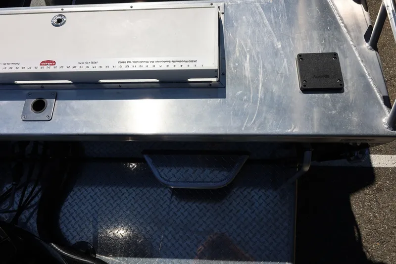 Slide: The Image of Aluminum deck of 2025 Thunder Jet 200 Luxor boat with measurement tool and fittings. - 21