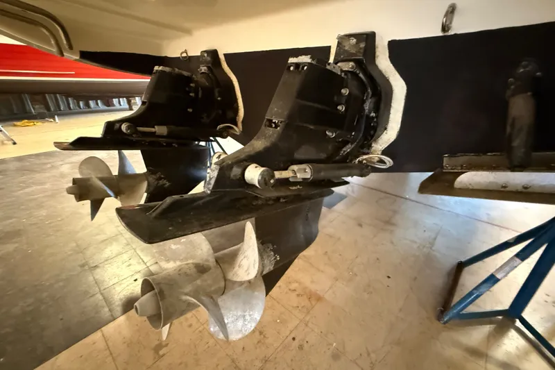 Slide: The Image of Close-up of 2005 Maxum 3300 SE boat propellers and stern drive in a workshop. - 7