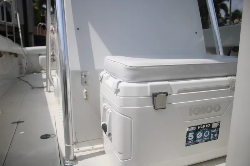 Slide: The Image of 1996 Jupiter 31 Center Console boat with Igloo cooler on deck. - 12