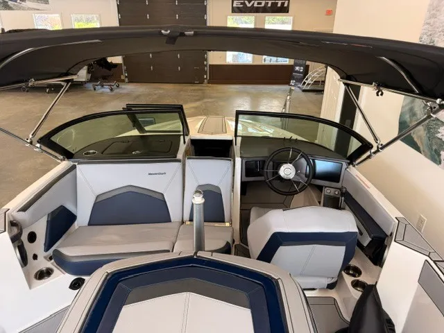 Slide: The Image of The image shows the cockpit of a 2026 MasterCraft ProStar with modern seating and a sleek steering wheel. - 10