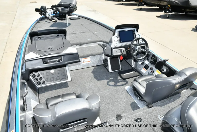 Slide: The Image of The image shows the cockpit of a 2021 Nitro Z21 Pro boat with gray seats and modern electronics. - 43