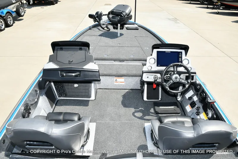 Slide: The Image of The image shows the cockpit of a 2021 Nitro Z21 Pro boat with two seats and a helm. - 11