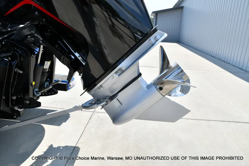 Slide: The Image of Close-up of a boat propeller on a 2021 Nitro Z21 Pro, set on a concrete surface. - 24