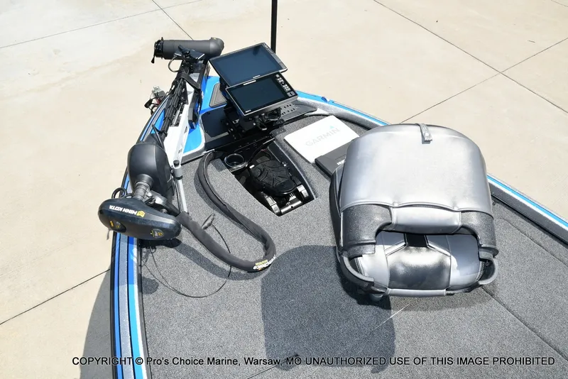 Slide: The Image of The image shows the deck of a 2021 Nitro Z21 Pro boat with a fish finder and a seat. - 13