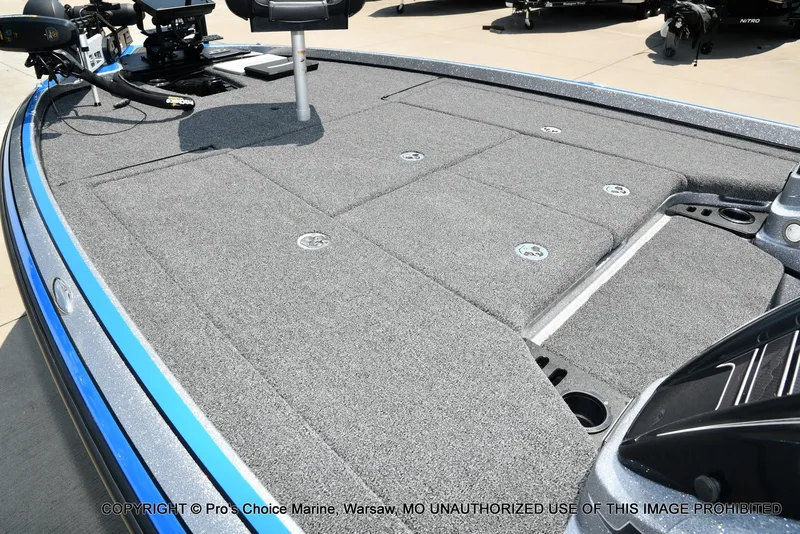 Slide: The Image of The image shows the deck of a 2021 Nitro Z21 Pro boat with gray carpeting. - 41