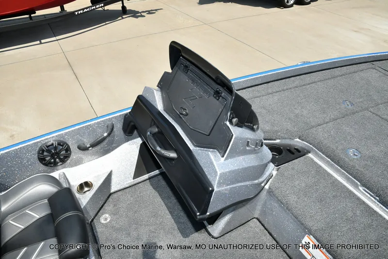 Slide: The Image of The image shows the deck of a 2021 Nitro Z21 Pro boat with storage space. - 50