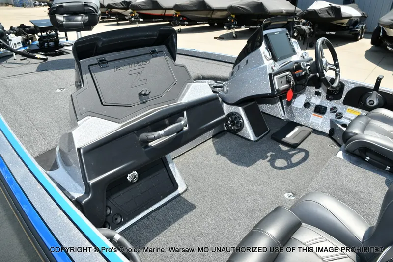 Slide: The Image of The image shows the cockpit of a 2021 Nitro Z21 Pro boat with modern controls. - 17