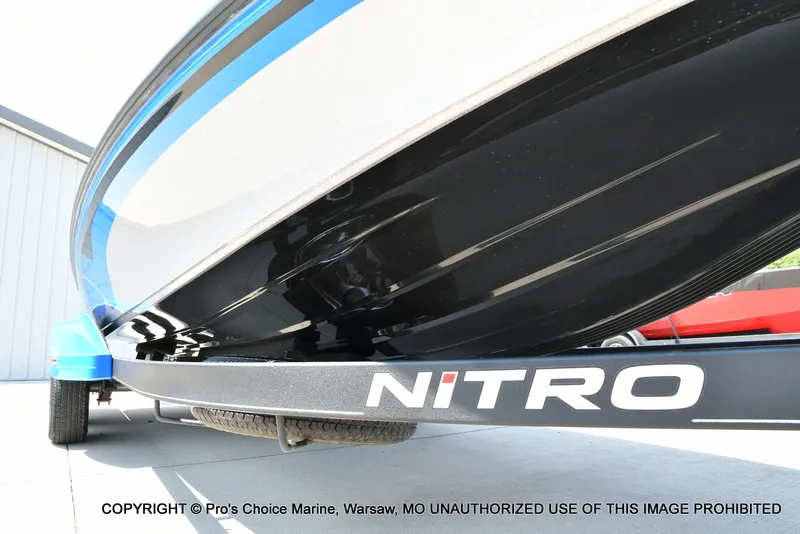 Slide: The Image of Close-up of the hull of a Nitro Z21 Pro boat on a trailer. - 33
