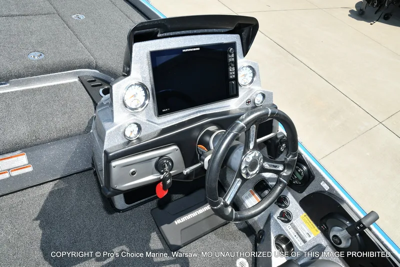 Slide: The Image of The image shows the cockpit of a Nitro Z21 Pro boat with a modern helm station. - 46