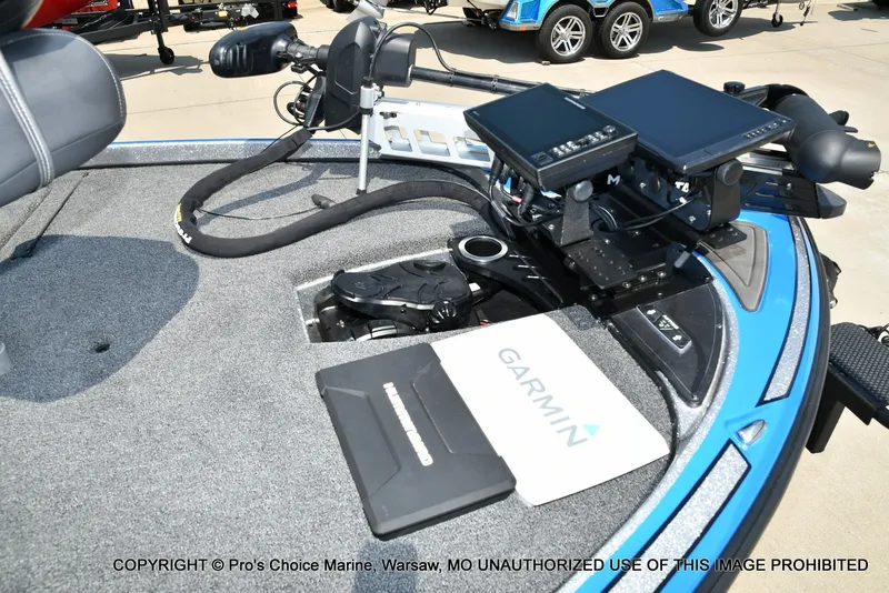 Slide: The Image of The image shows the cockpit of a 2021 Nitro Z21 Pro boat with Garmin electronics. - 36