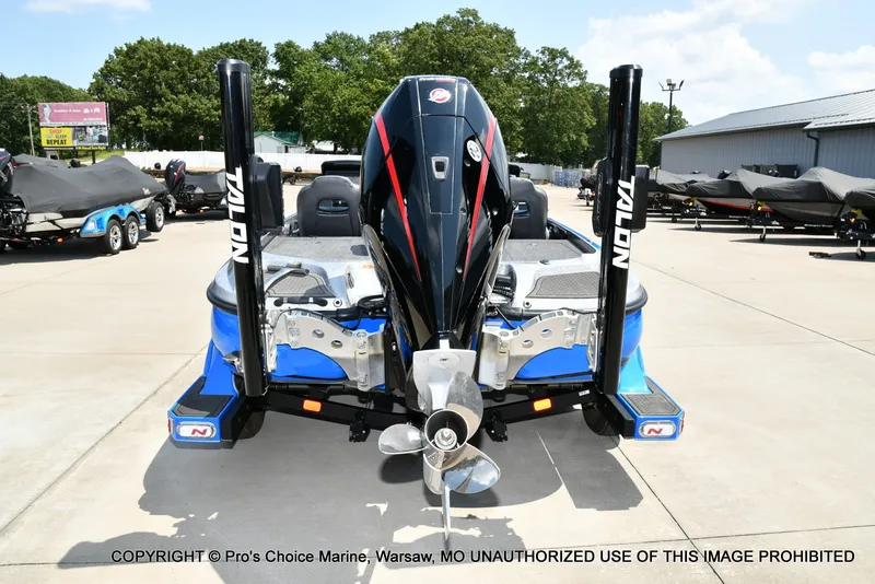 Slide: The Image of The image shows a blue 2021 Nitro Z21 Pro boat with a powerful outboard motor. - 9