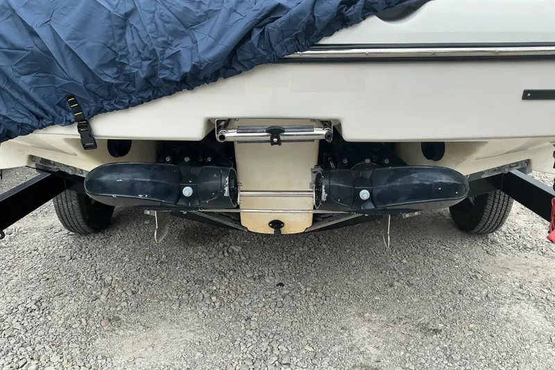 Slide: The Image of The image shows the rear of a Sea-Doo Sport Boat, model 210 Challenger SE, year 2010. - 14