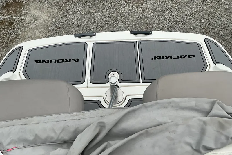 Slide: The Image of Rear view of a Sea-Doo 210 Challenger SE with gray upholstery and cover. - 9
