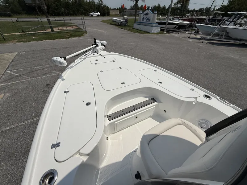 Slide: The Image of The image shows the deck of a 2024 Sea Hunt BX Series 22-LOADED OUT boat. - 9