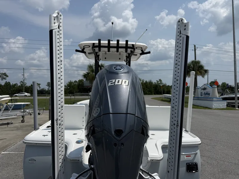 Slide: The Image of A 2024 Sea Hunt BX Series 22-LOADED OUT boat with a 200 HP outboard motor. - 3