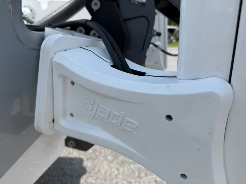 Slide: The Image of Close-up of a boat detail with the word "Blade" on a white component. - 5